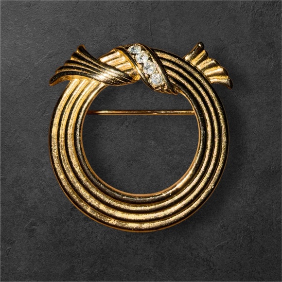 Avon Jewelry - Vintage Avon Elegant Gold toned Brooch with Crystal rhinestone Accents